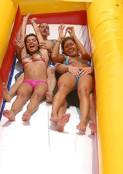 2 amazing bikini latinas slide down a backyard waterslide then get pounded hard in this hot amateur party pic set